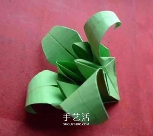 Hand-folding lilies illustrates the steps of folding a simple paper lily