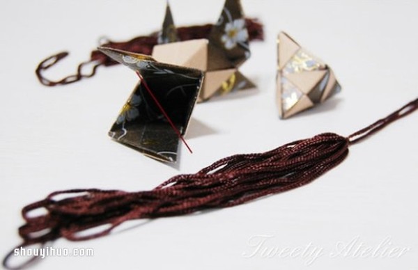 Illustrations of folding origami three-dimensional rhombuses for use as packaging boxes or pendants