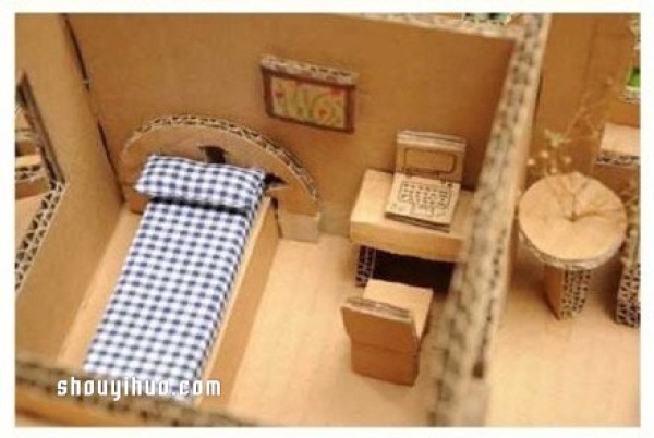 Want to live in a house model made from discarded cardboard boxes? 