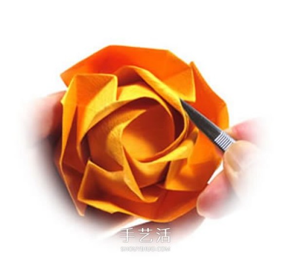 Transform and fold beautiful paper roses by hand on Kawasaki Rose