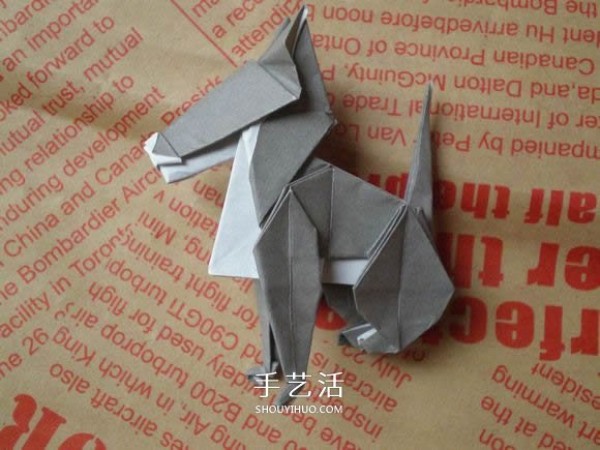 Illustrations of how to fold a cute puppy. Step-by-step pictures of origami puppies.