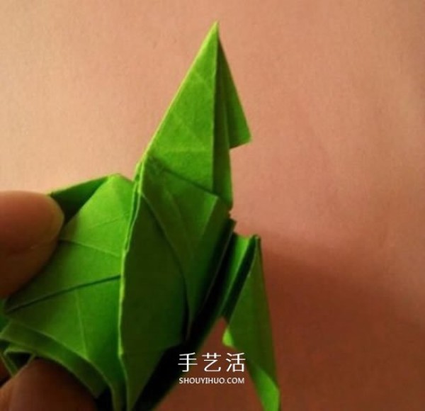 An illustrated tutorial on folding a rose from a piece of paper, including the calyx