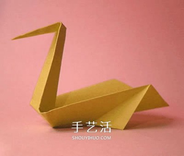 Childrens handmade origami swan, diagram of folding paper swan, step by step diagram