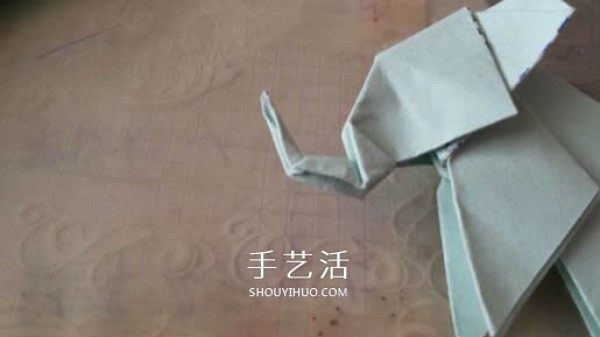 How to fold a three-dimensional elephant with diagrams and instructions for folding origami and a standing elephant