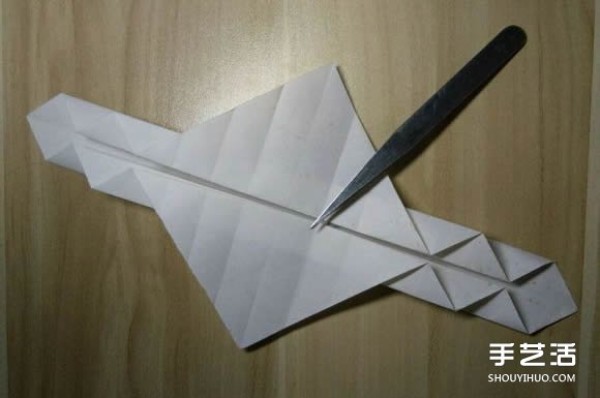 Flying origami heart with steps to fold a heart-shaped with wings