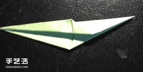 How to fold a four-petaled flower with illustrated steps. How to make an origami four-petaled flower by hand