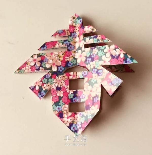 A simple and beautiful paper-cutting method for New Years three-dimensional spring-character hanging ornaments