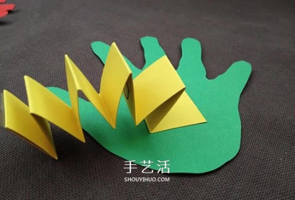 Creative childrens birthday cards are made with cardboard and two cute palms are cut