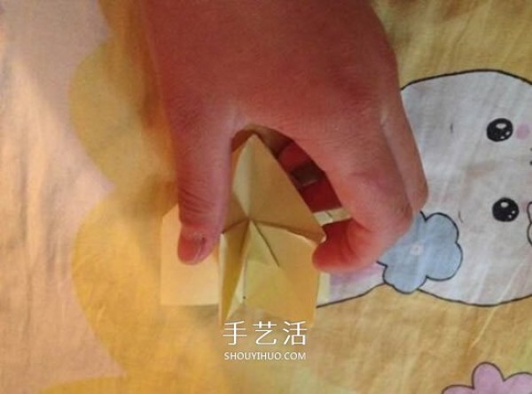 Four-petaled flower origami illustrated tutorial how to fold a four-petaled flower by hand