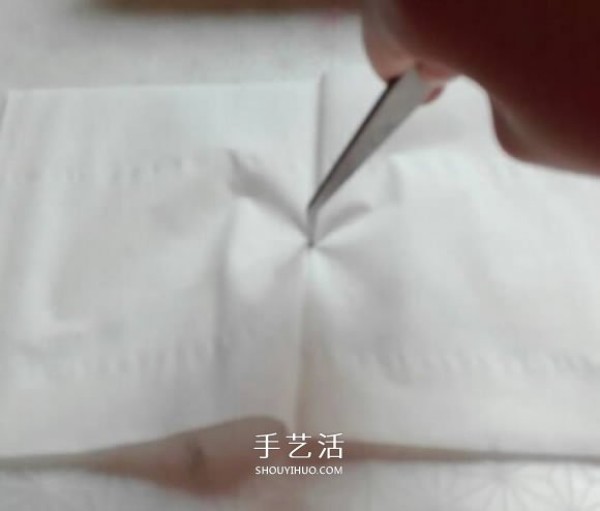 It only takes a few minutes to fold a rose from a napkin