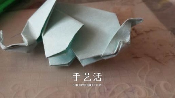 How to fold a three-dimensional elephant with diagrams and instructions for folding origami and a standing elephant