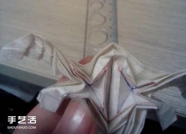 The origami method of a beautiful angel, the manual folding of a three-dimensional angel with illustrations