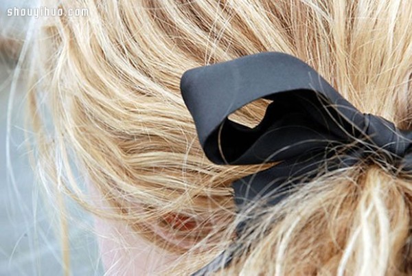 A black satin ribbon that is a bit romantic, but not too girly, a feminine hair accessory