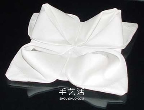 Handmade napkin folding roses, illustration of how to fold beautiful tableware roses