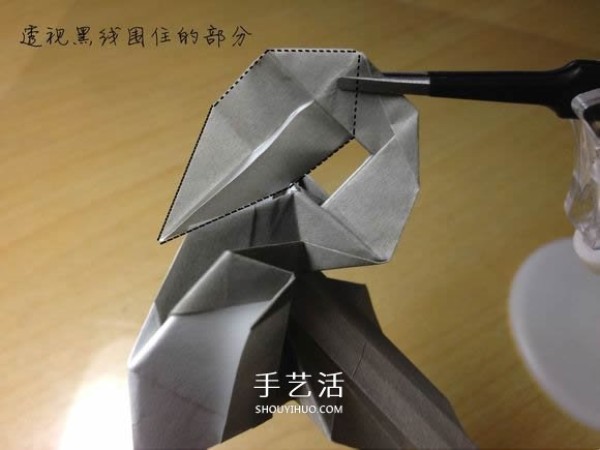 The origami method of an excavator illustrates the folding process of a manual excavator