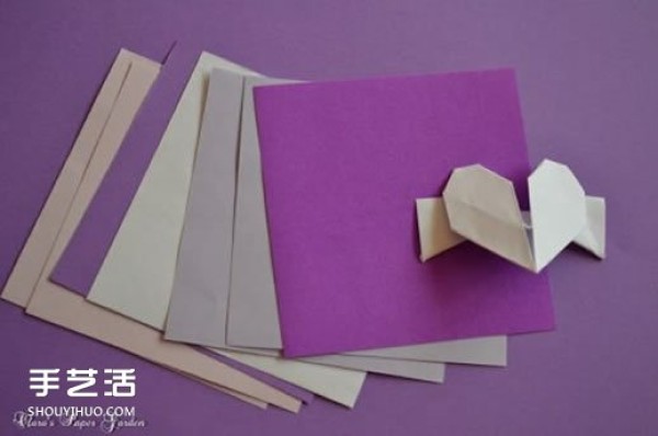 Love garland origami step-by-step illustration to make a beautiful garland with origami hearts