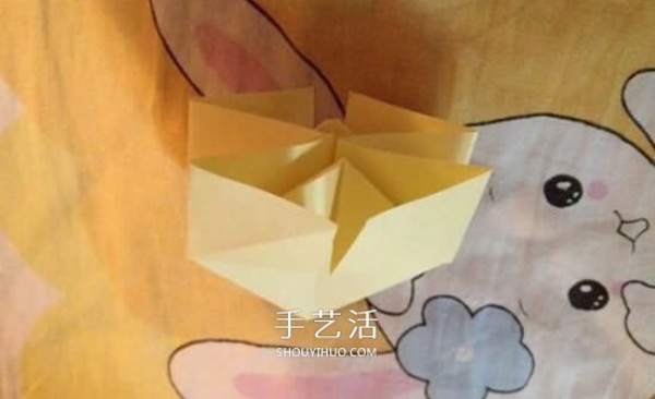 Four-petaled flower origami illustrated tutorial how to fold a four-petaled flower by hand