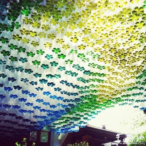 Car awning made from discarded beverage bottles