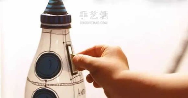 How to make a handmade cartoon rocket piggy bank with a milk bottle