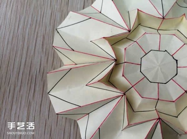 Illustrated tutorial on how to fold an eight-petal flower, steps in the process of origami an eight-petal flower