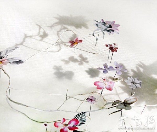 Exquisite DIY paper art works of paper flowers and branches