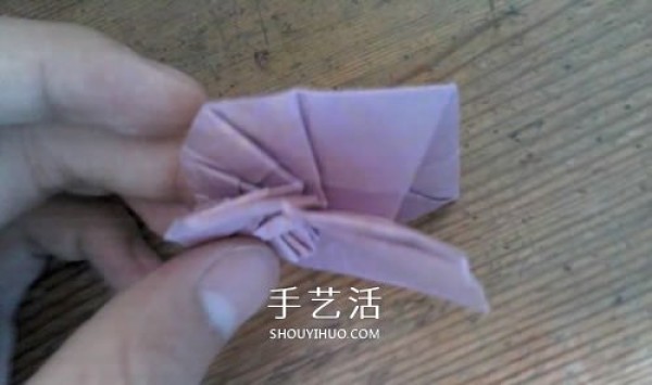 Looks a bit like a goats horn! Illustration of handmade snail shell origami method