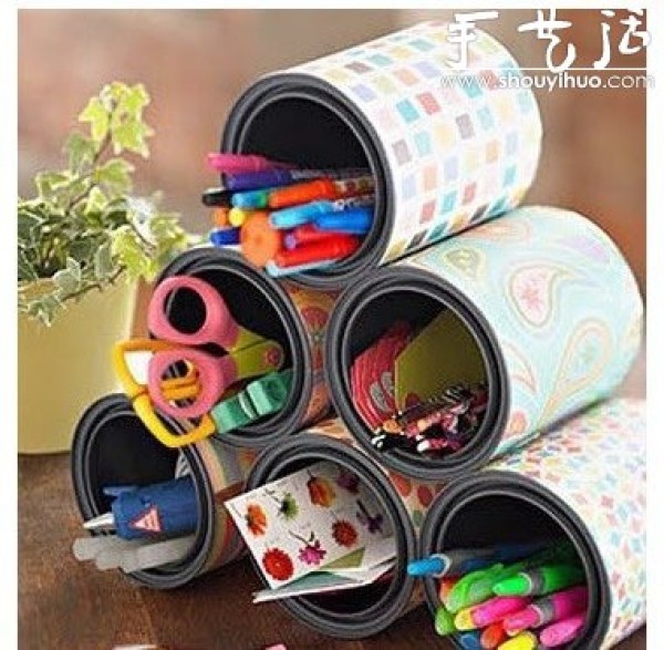 Utilize waste iron cans and transform them into pen holders and flower pots