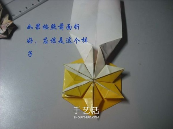 How to fold a paper money medal and illustrate the method of hand-made origami medals