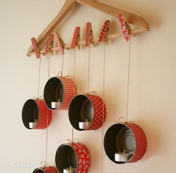 Iron can waste is used to DIY a beautiful wall-mounted candle holder