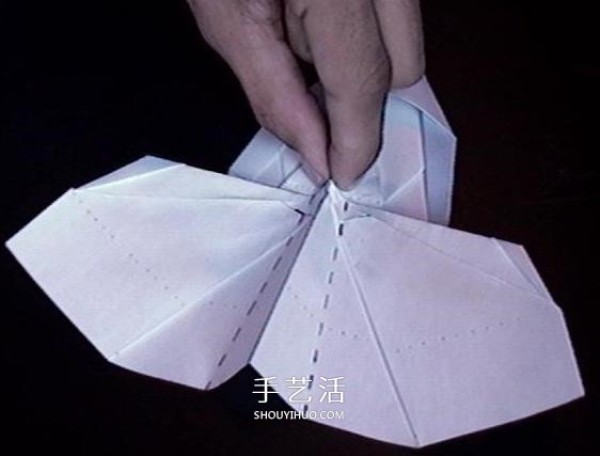 A detailed illustration of how to fold an Avengers paper plane or an origami fighter plane