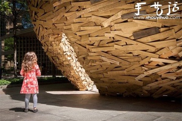 10,000 wooden planks are used to make a DIY birds nest-shaped building