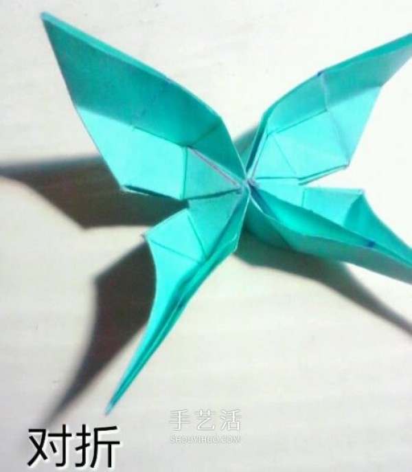 An illustration of origami butterfly origami tutorial, steps for folding a swallowtail butterfly