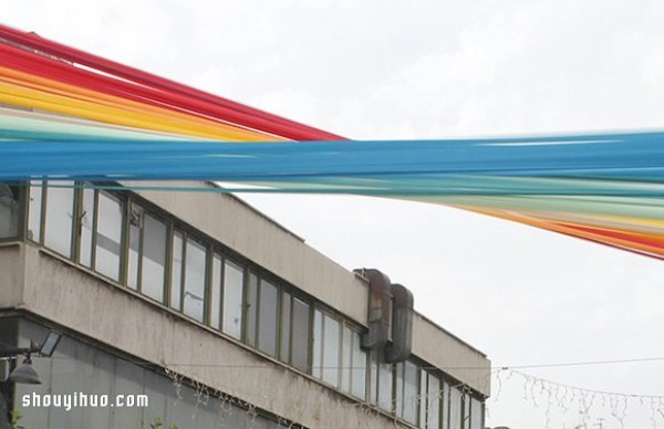 Look up and see a rainbow, a beautiful corner created by 150 colorful ribbons