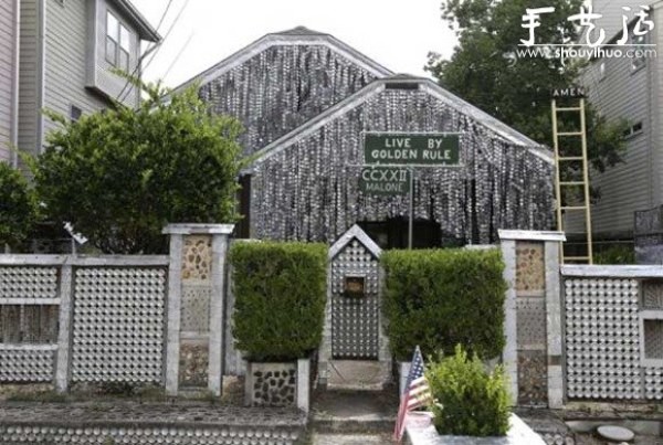 A house decorated with more than 50,000 beer bottles and cans