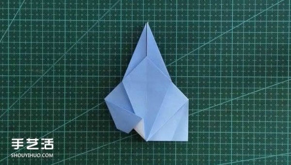 Handmade origami girls head illustration, step-by-step folding method for a girl with short hair