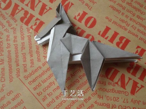 Illustrations of how to fold a cute puppy. Step-by-step pictures of origami puppies.