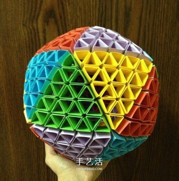 Illustration of the steps of hand-made origami Snapology ball using paper strips to make a sphere