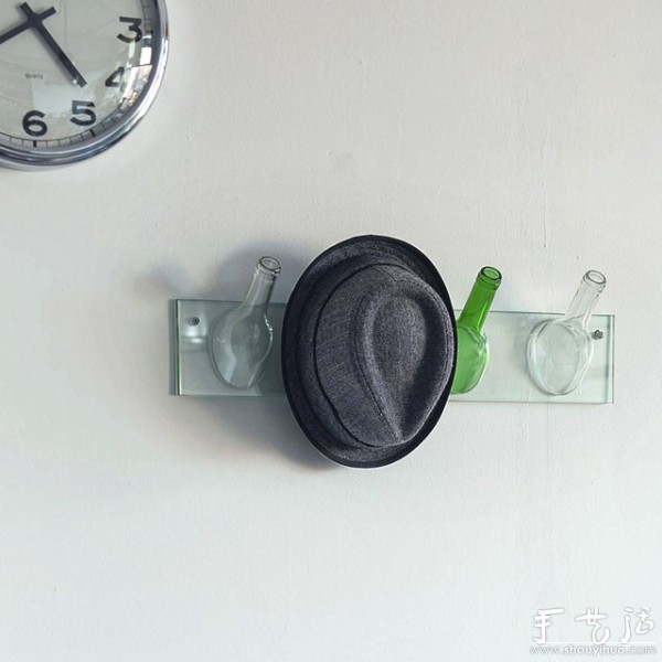 DIY wall hooks using old wine bottles