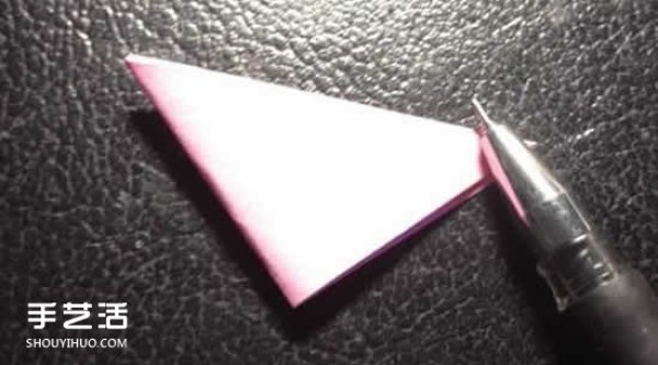 How to fold a four-petaled flower with illustrated steps. How to make an origami four-petaled flower by hand