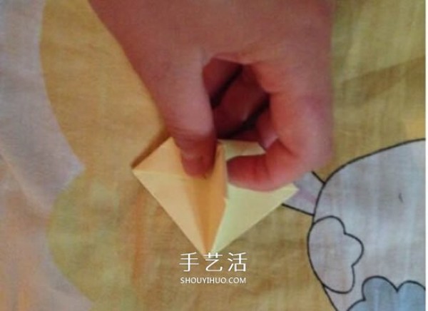 Four-petaled flower origami illustrated tutorial how to fold a four-petaled flower by hand