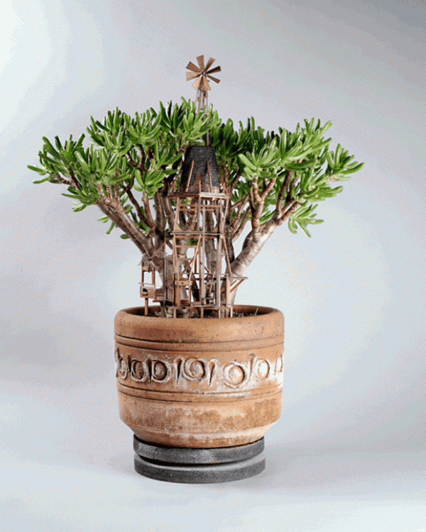 DIY exquisite treehouse model on a potted plant, a Lilliputian-like miniature building