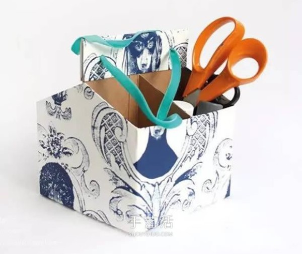 Milk cartons are made into a pen holder/storage box that can be carried