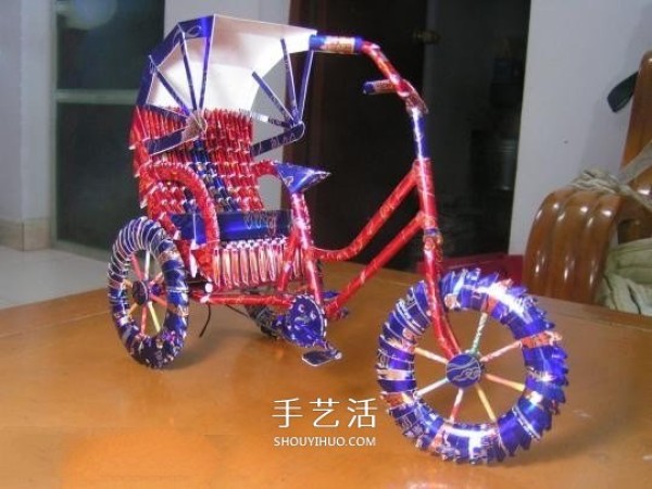 Handmade rickshaw made from cigarette boxes. Do you want a two-wheeled or three-wheeled one? 