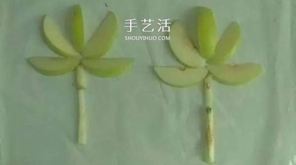 Simple pear handicraft method for children to use fruits to spell flowers