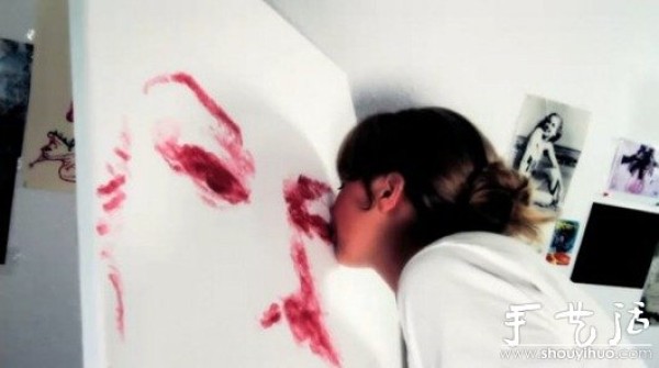 A painting created by lips and lipstick