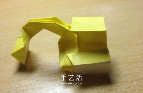 The origami method of an excavator illustrates the folding process of a manual excavator