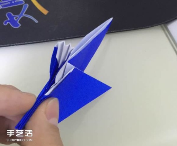 Illustration of the folding method of a spouting whale, step-by-step process of origami three-dimensional whale