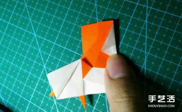 How to make an origami kingfisher with detailed instructions on how to fold a kingfisher