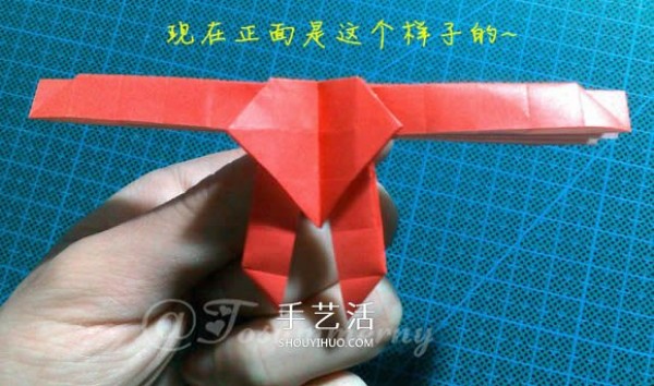 Illustration of how to fold a beautiful origami angel heart ring as a small origami gift for lovers