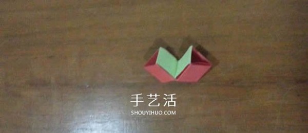 Illustration of the steps of hand-made origami Snapology ball using paper strips to make a sphere